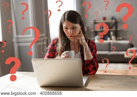 Woman Teleworker Works At Home With A Laptop But Has Some Questions