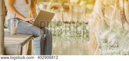 Asian Businesswoman Working Online. Freelancer Using Technology And Social Network. New Normal Lifes