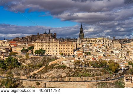 Toledo, Spain. Old City With Its Alcazar, Royal Palace Over The Tagus River Sinuosity. Spain, Europe