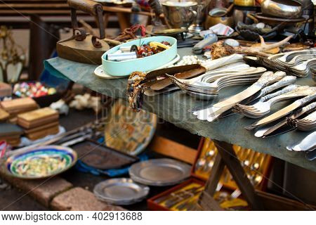Different Antiques On Flea Market Or Festival - Aged Vintage Silver Cultery - Spoons, Knifes, Forks,