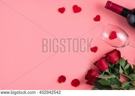 Valentine's Day Dating Gift With Wine And Rose Concept On Pink Background