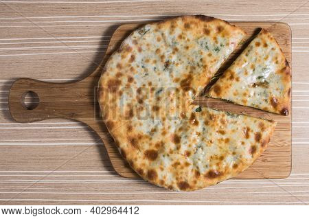 Megruli A Typical Georgian Focaccia Stuffed With Cheese And Meat