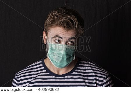 Young Male Mime Artist With Face Mask