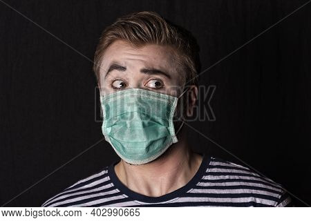 Young Male Mime Artist With Face Mask