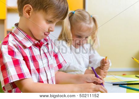 Two Cute Little Prescool Kids Drawing