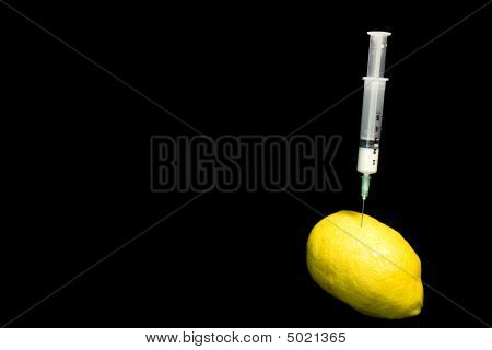 Sprøjte på en citron