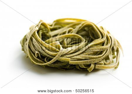 Italian pasta tagliatelle on white background