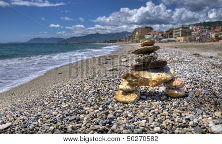 Balanced Stones By The Sea