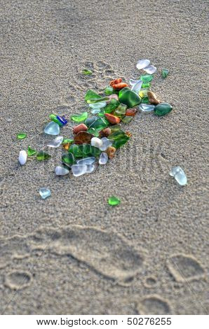 Colored Pebbles On The Sand