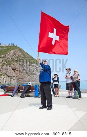 MOUNT PILATUS - JULY 13: Unidentified man demonstrating traditional swiss 