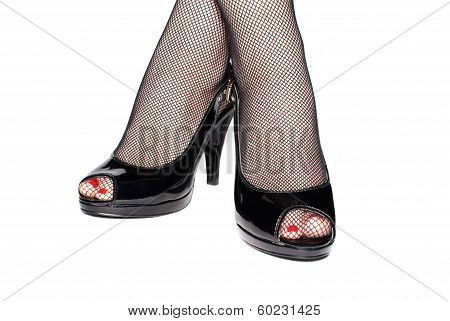 Female Legs In Black Shoes Isolated