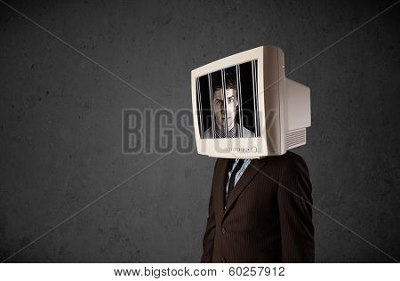 Business man with monitor screen on his head traped into a digital system concept