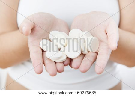 Pills In Women Hands
