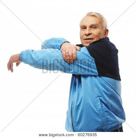 Senior man in training suit doing warm-up stretching exercises 