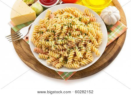 pasta fusilli in plate isolated on white background