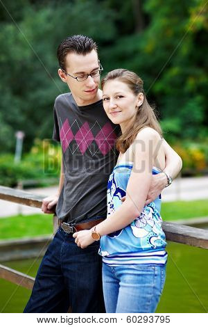 Happy Couple On A Walk In Park