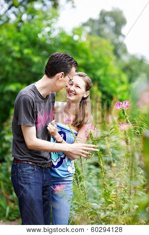 Happy Couple On A Walk In Park
