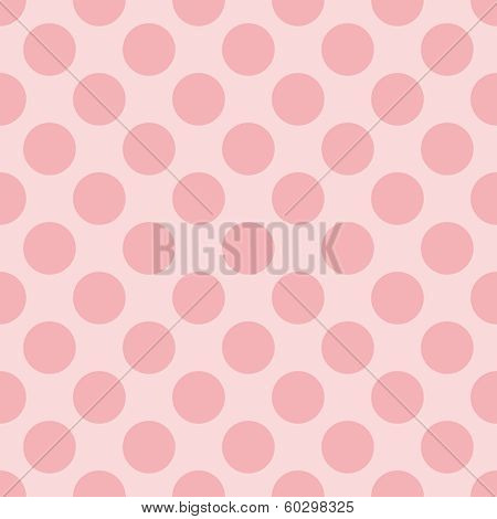 Seamless pastel vector pattern with dark pink polka dots on a sweet baby pink background