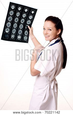 Woman Doctor With X-rays Of Brain