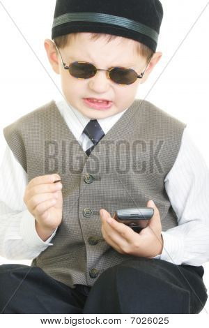 Vexed Kid With Palm Computer And Stylus