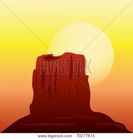 Desert rock formation in the sunset