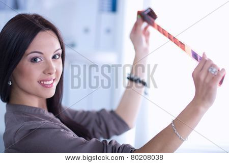 Woman is a proffessional photographer with camera