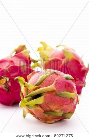 Close-up On Three Whole Strawberry Pears
