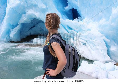 Young woman on the Nigardsbreen, glacier in Norway.