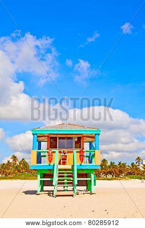MIAMI, USA - JULY 6, 2012: wooden colorful beach watch hut at the beautiful white beach of South beach, Miami.