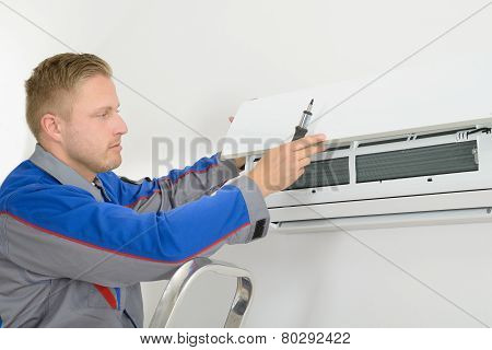 Repairer Repairing Air Conditioner