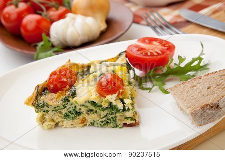 One Piece Of Kale Tomato Frittata