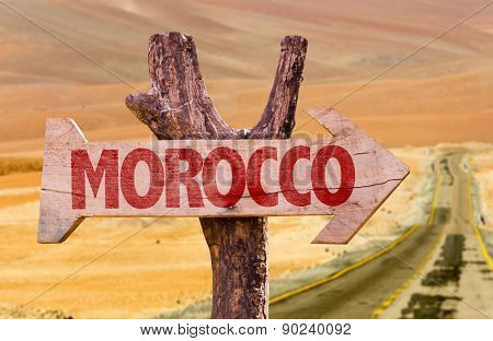 Morocco wooden sign with desert background