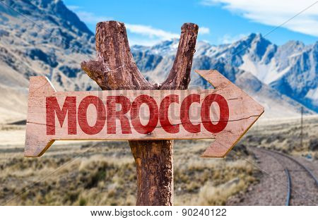 Morocco wooden sign with desert background
