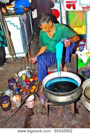 Dyer Works At Outdoor Factory