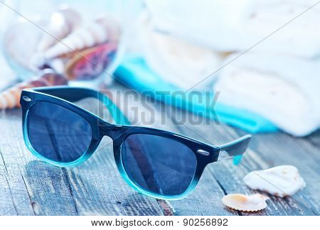Sun Glasses And Flip Flops
