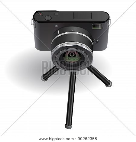 Digital Photo Camera On Small Tripod.
