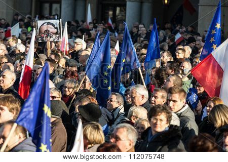 CRACOW POLAND - DECEMBER 19 2015: Cracow Main Square - The demonstration of the Committee of the Defence Protection of the Democracy against the break of law through the government PIS in Poland.
