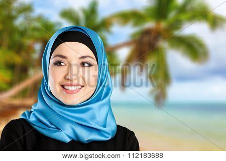 Close-up Beautiful Young Muslim Woman on  background