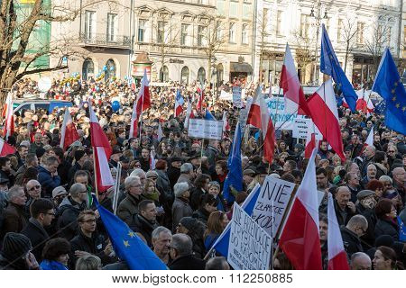 CRACOW POLAND - DECEMBER 19 2015: Cracow Main Square - The demonstration of the Committee of the Protection of Democracy / KOD/ against the break of law through the government PIS in Poland.