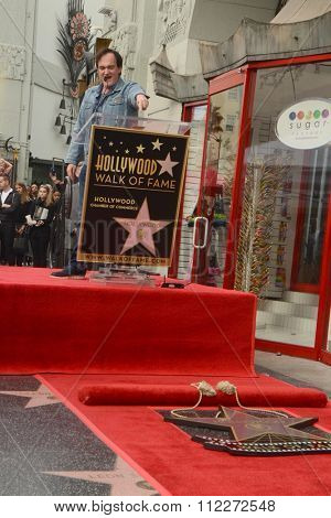 LOS ANGELES - DEC 21:  Quentin Tarantino at the Quentin Tarantino Hollywood Walk of Fame Star Ceremony at the Hollywood Blvd on December 21, 2015 in Los Angeles, CA