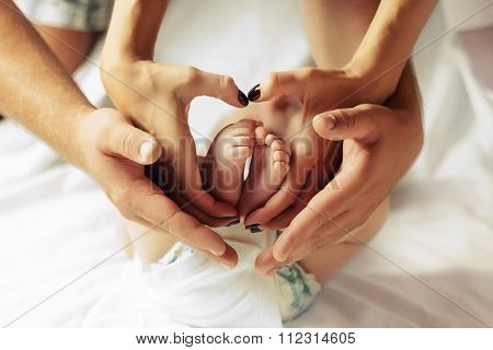 Family hands of his father, mother and scildren