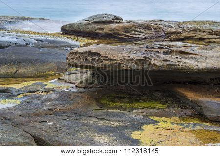 Rocks and waves at Point Cartwright