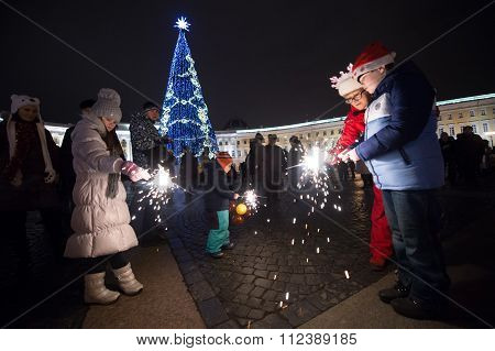 People With Sparklers New Year's Eve