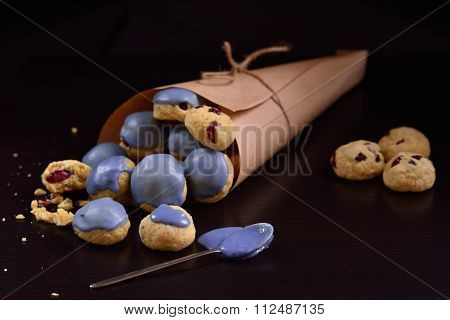 Biscuits Blue Glaze On A Dark Background