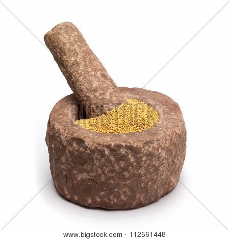 Organic yellow mustard in mortar.