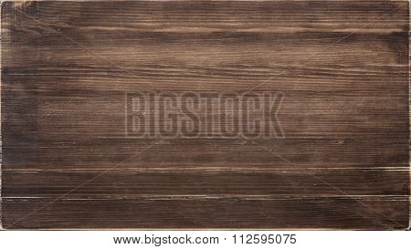 Wooden texture, dark brown wood board.