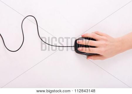 Female hand using PC mouse.