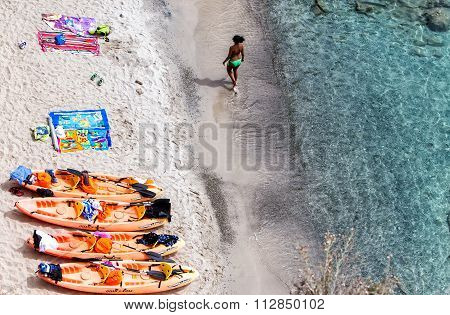 Top View Of Canoes At Tsigrado Beach In Milos Island, Cyclades, Greece