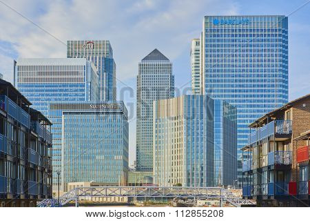 LONDON, UK - DECEMBER 28: Canary Wharf's banks' skyscrapers on sunny blue sky day seen from Blackwall. December 28, 2015 in London.