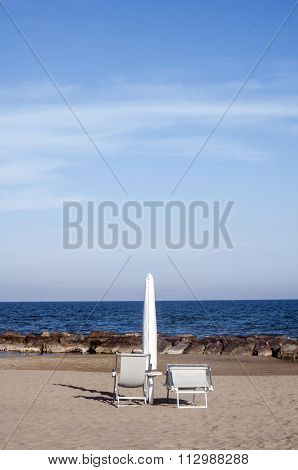 chairs and umbrella on the beach